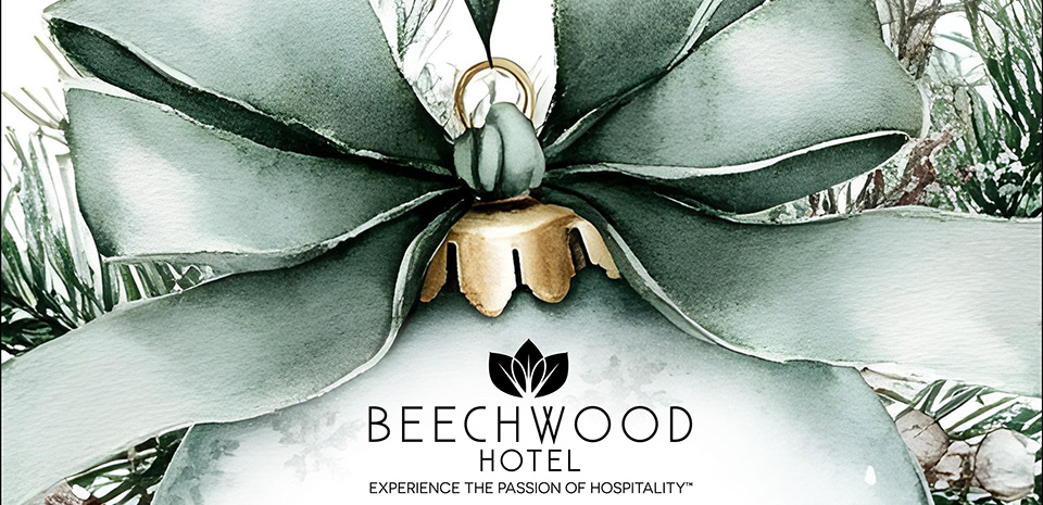 Watercolor-style holiday ornament with a large green bow and pine branches, featuring Beechwood Hotel logo and tagline ‘Experience the Passion of Hospitality’