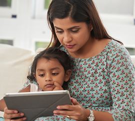 Photo of a woman using a tablet