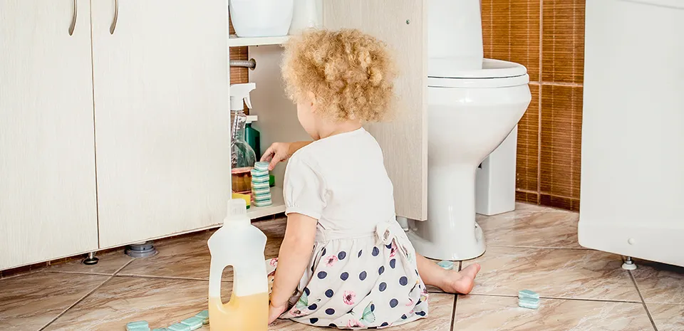 child getting into mischief with chemicals