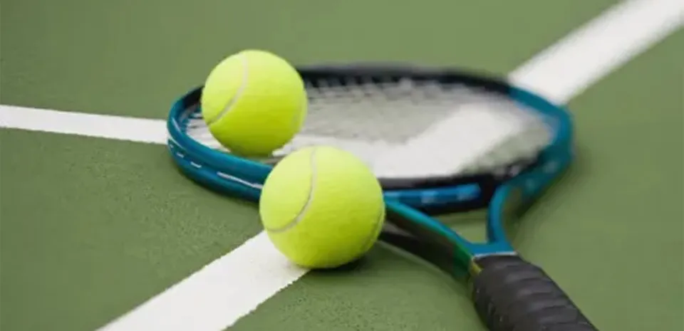 tennis balls and tennis racket