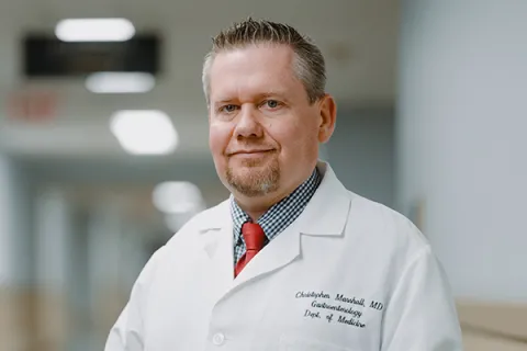 A doctor in a white coat