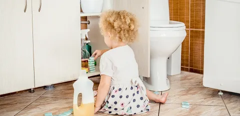 child getting into mischief with chemicals