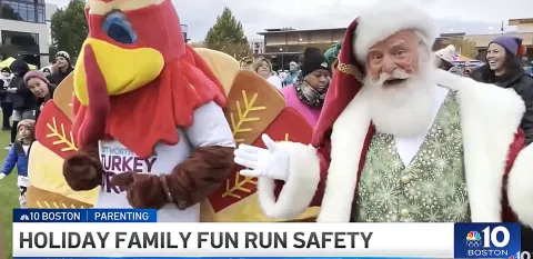Holiday mascots participate in a holiday fun run.