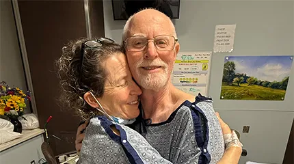 Kidney donor, Montana Miller and her former middle school teacher Mitchell Grosky hugged after their surgeries.