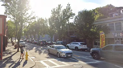 Cars and pedestrians in Worcester's Main South neighborhood. 