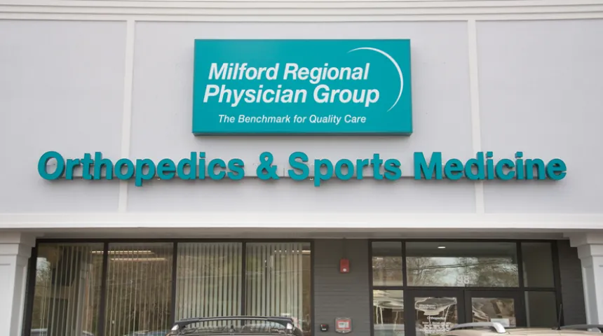 The "Orthopedics and Sports Medicine" sign on the exterior of the building.