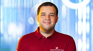 UMass Memorial Health caregiver, Ramon Baez, representing hiring events.