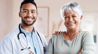 Image of woman has an appointment with and her physician to discuss managing her diabetes.