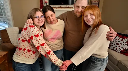 Adelaide Greenwald of Uxbridge, left, with her mother, Alexa Romasco, father, Jared Greenwald, and sister, Zophie Greenwald. Adelaide had surgery to fill a hole in her heart, a condition called patent foramen ovale. 