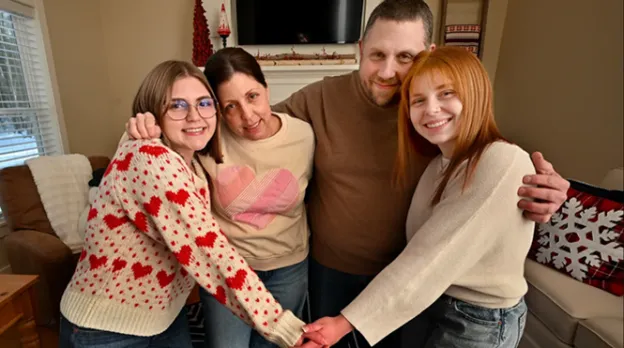 Adelaide Greenwald of Uxbridge, left, with her mother, Alexa Romasco, father, Jared Greenwald, and sister, Zophie Greenwald. Adelaide had surgery to fill a hole in her heart, a condition called patent foramen ovale. 