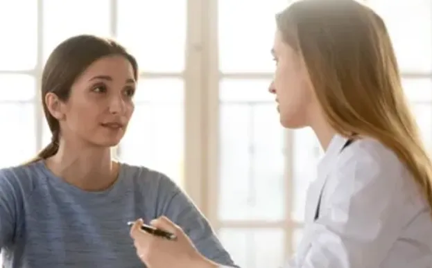 sick patient discussing options with doctor