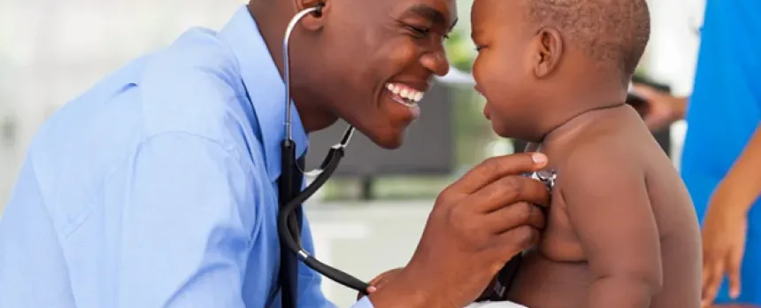 Doctor providing emergency care to baby