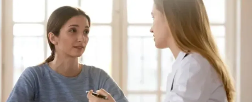 sick patient discussing treatment options with doctor