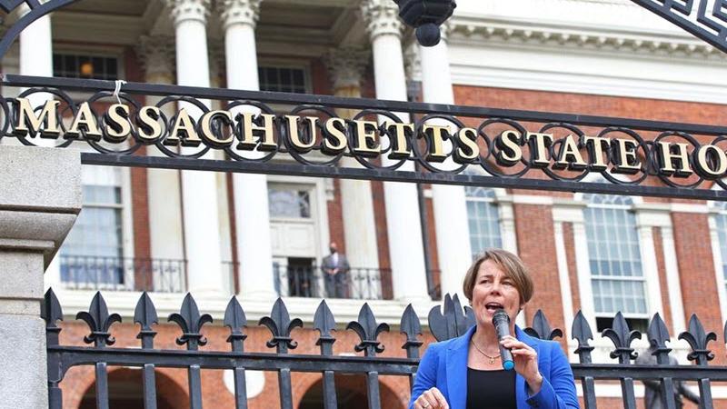 Governor Maura Healey speaks outside of the Massachusetts State House